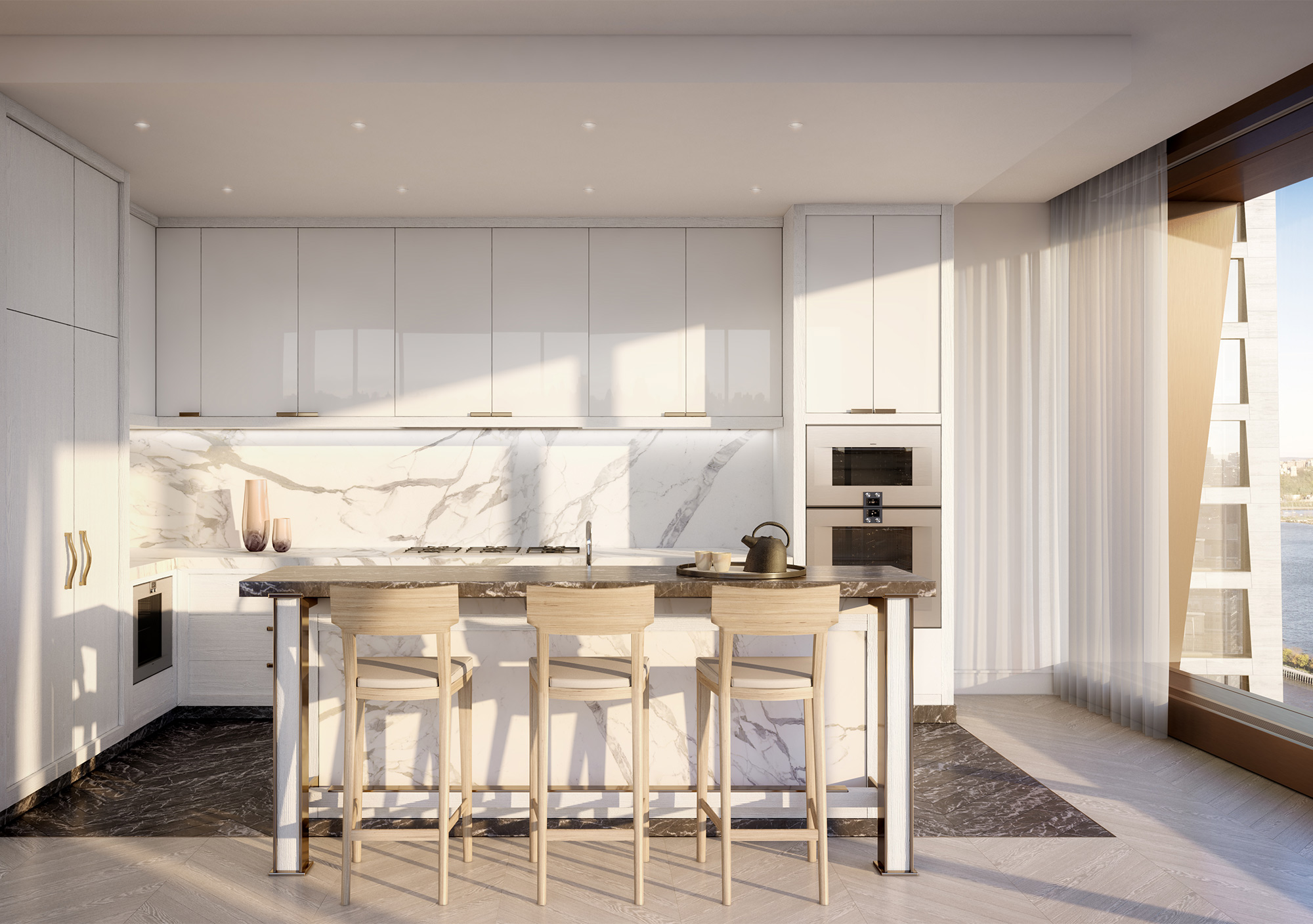 Light shining into kitchen with white cabinets and marble walls